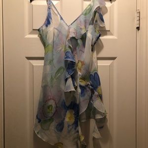 Beautiful Camisole top that is 100 percent silk. Only wore twice. Excellent!!!